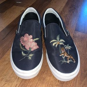 slightly worn embroidered vans